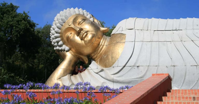 Asian sculptures and Buddha statues in the Bacalhôa Buddha Eden garden on the Silver Coast of Portugal