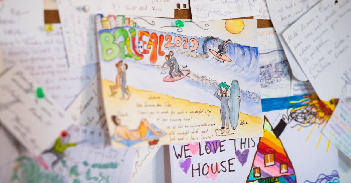 Colourful guestbook pages with drawings and messages